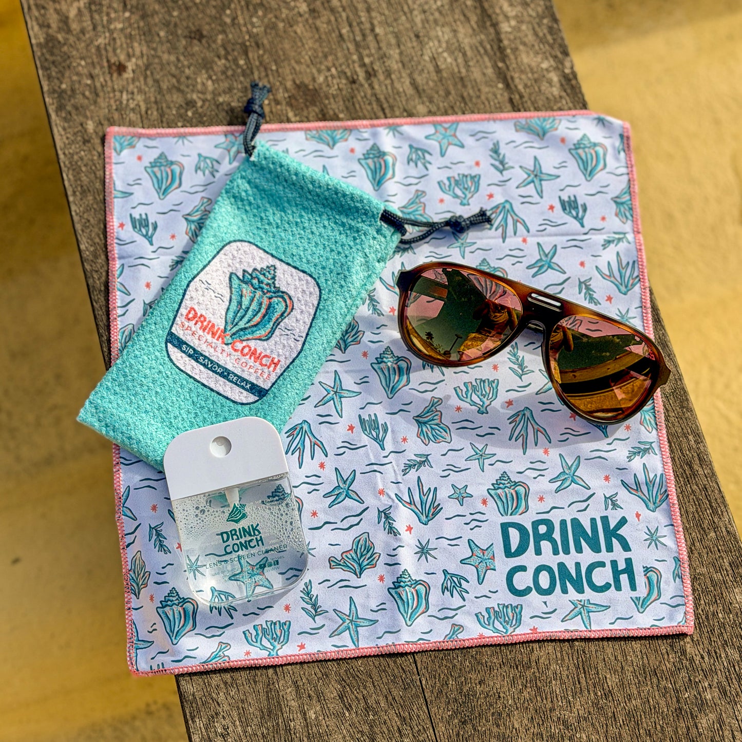 Sunglass and screen cleaning kit with Costa sunglasses